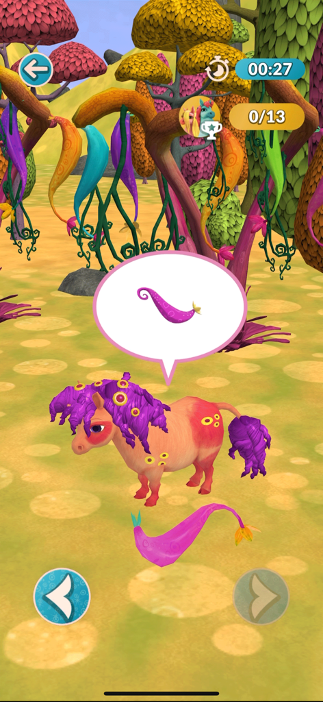 A pink unicorn character in a colorful magical forest from the Mia and me mobile game