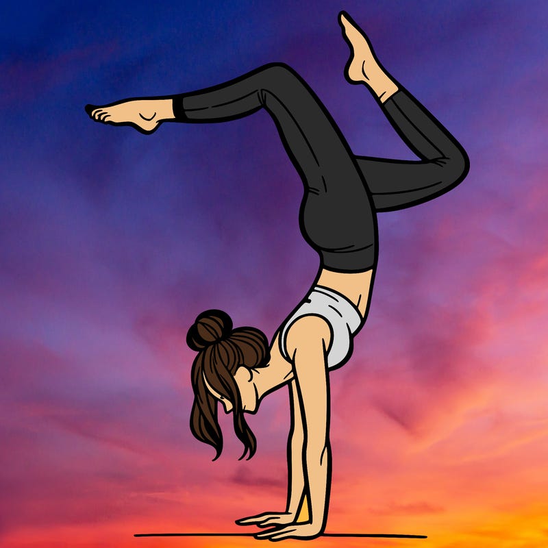a woman doing a handstand