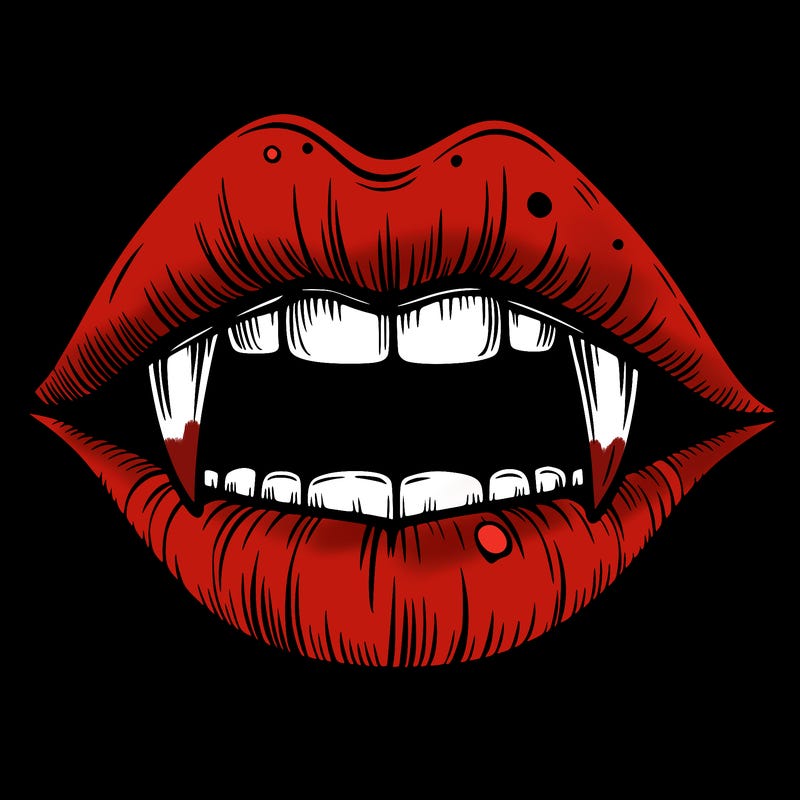 lips with vampire teeth