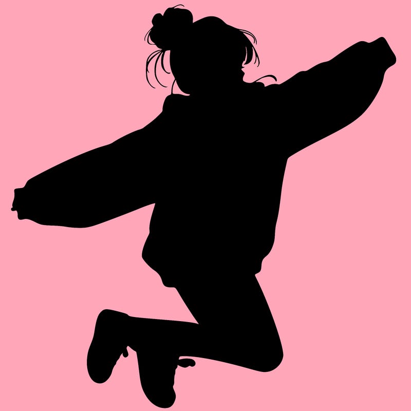 realistic girl jumping with a bun and oversized sweatshirt
