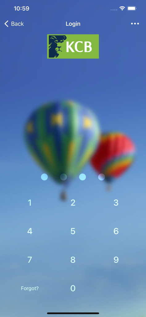 KCB iBank - Login screen of the KCB iBank app featuring a numeric keypad for PIN entry.