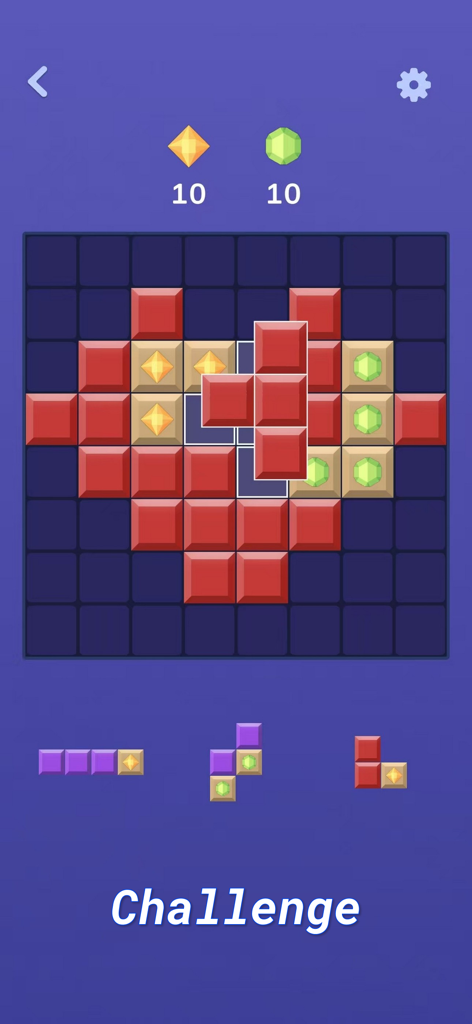 ブロッククラッシュのゲームプレイ画面、紫色のグリッド上の赤いブロックと宝石を使ったブロックパズルチャレンジが表示されています。