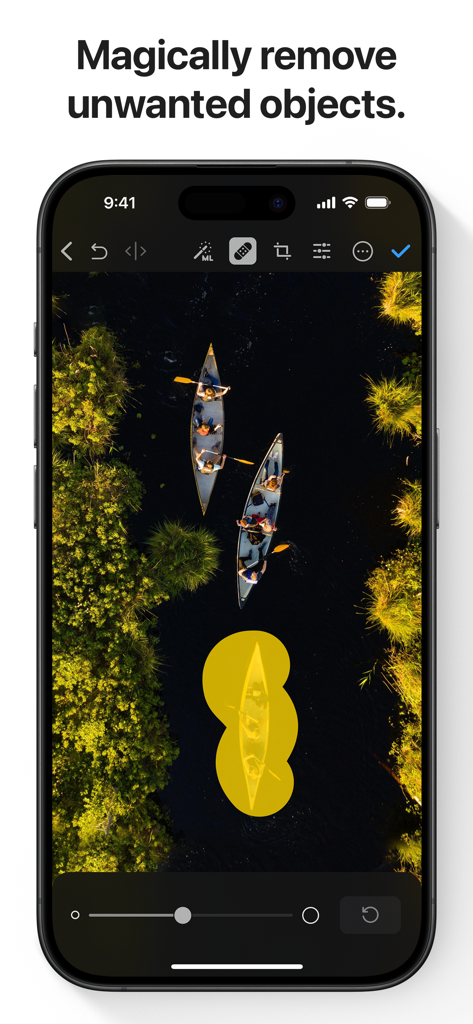 A screenshot of the Photomator app showing the AI-powered object removal tool being used on an aerial photo of canoes.