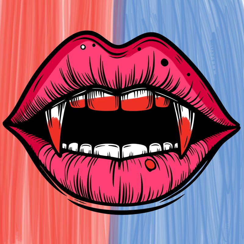 lips with vampire teeth