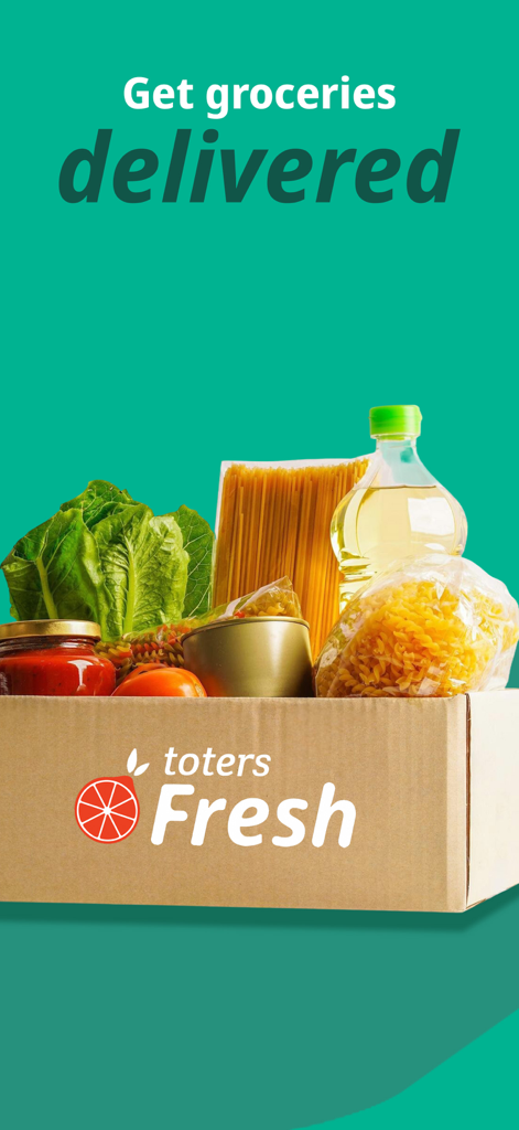 A cardboard box labeled Toters Fresh filled with groceries like pasta, lettuce, and oil for home delivery
