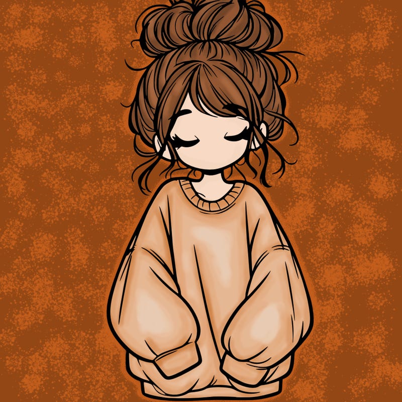 girl with baggy sweatshirt and messy bun