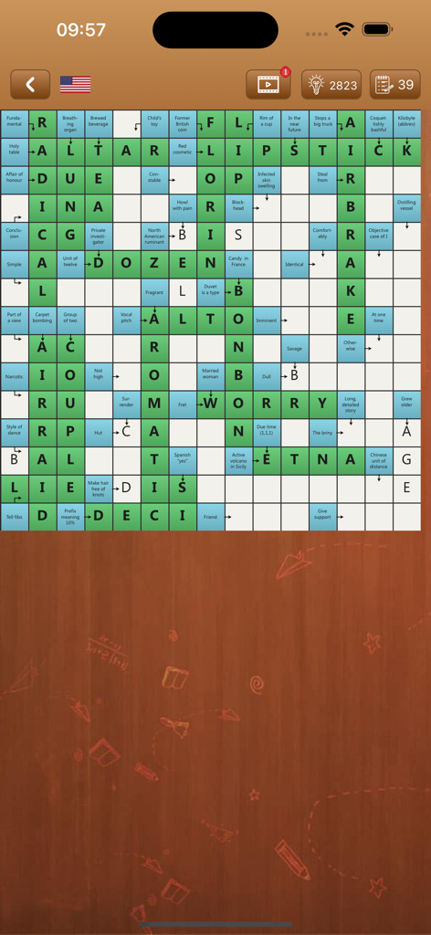 Сканворд Фан - A screenshot of the Scanword Fan app showing an English language scanword puzzle with several words completed in a green and white grid.