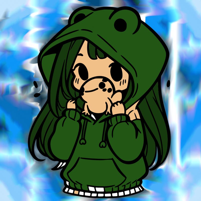 a girl holding a froggy hoodie