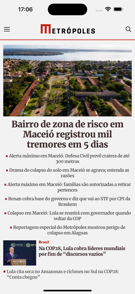 Metropoles app interface showing Brazilian news headlines and an aerial view of a city