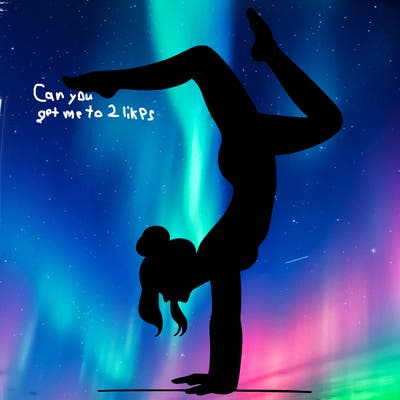 a woman doing a handstand