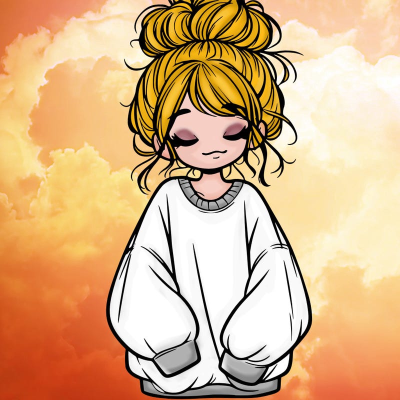 girl with baggy sweatshirt and messy bun