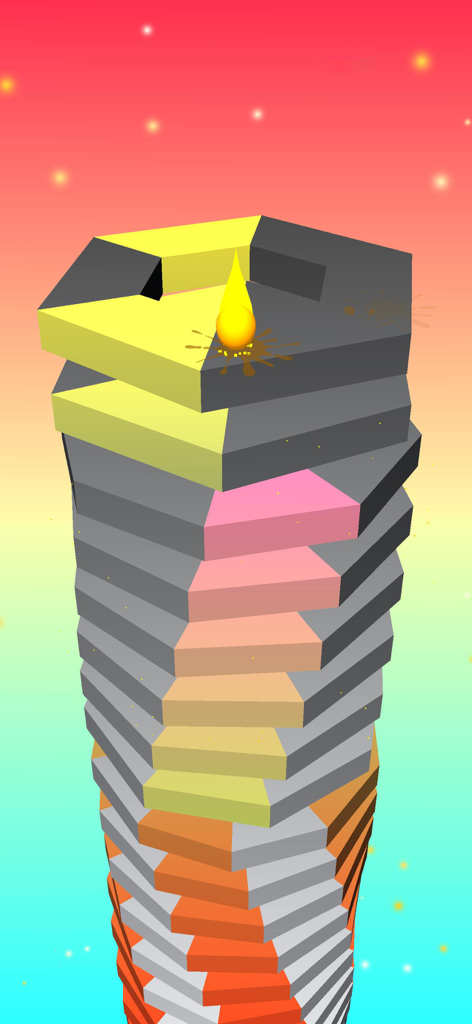 A yellow ball smashing through a rotating tower of colorful and black blocks in the Crush Ball game