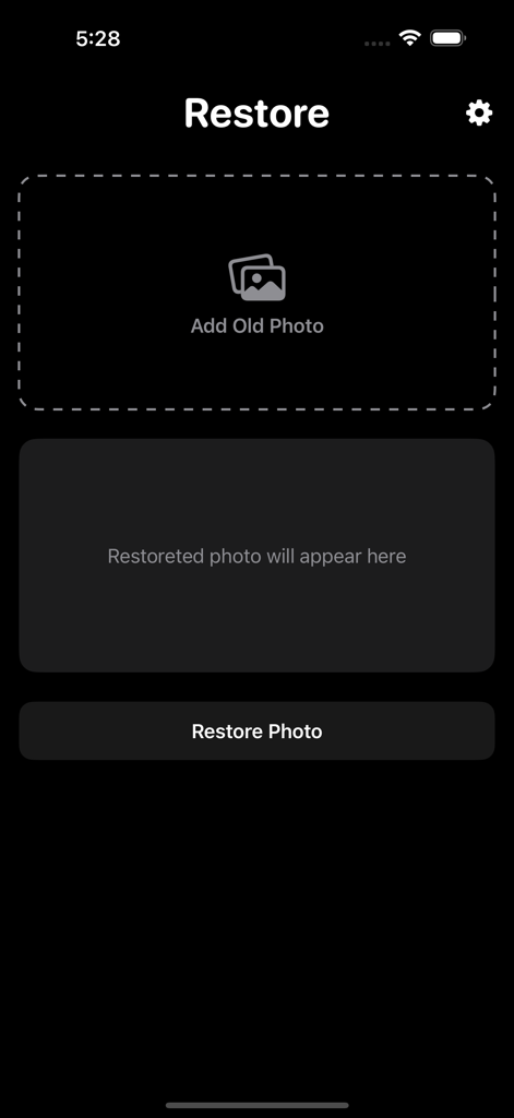 古い写真のアップロードエリアと復元ボタンが表示されている写真修復AIアプリのメインインターフェース