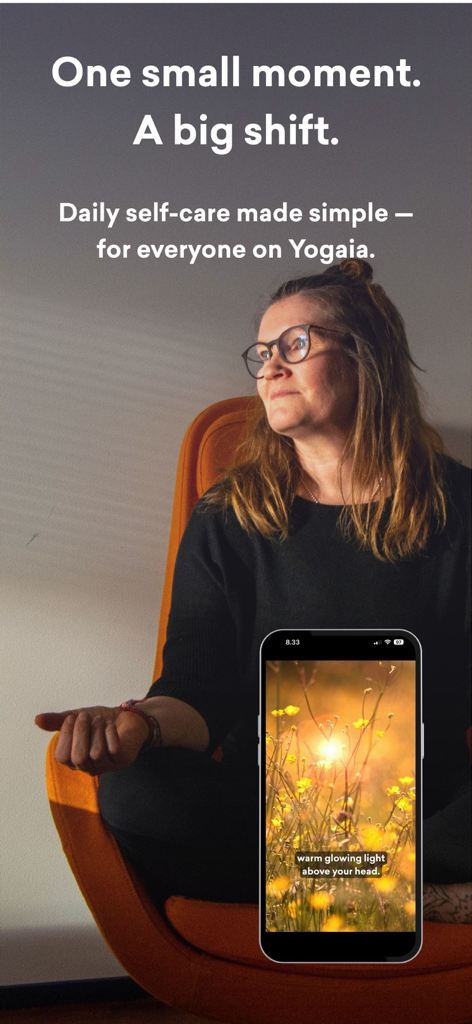 A woman practicing mindfulness with the Yogaia app for daily self-care