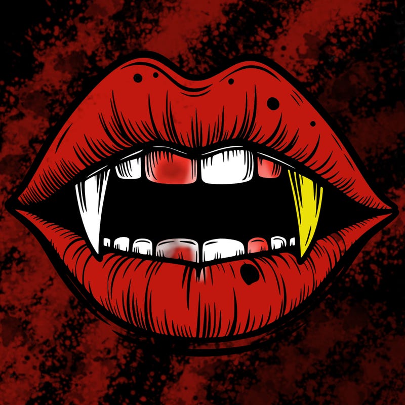 lips with vampire teeth