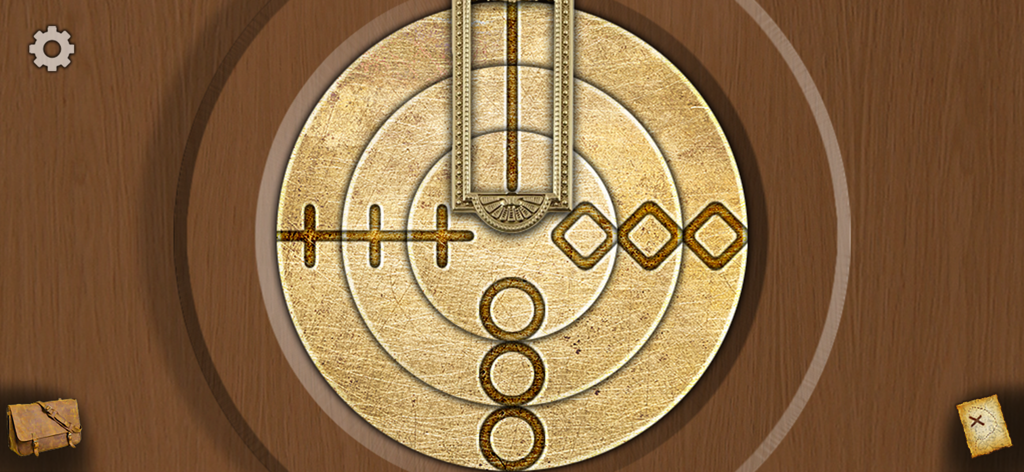 Adventure in Wonderland - Un mecanismo de puzle circular dorado con símbolos geométricos sobre un fondo de madera en Aventura en el País de las Maravillas
