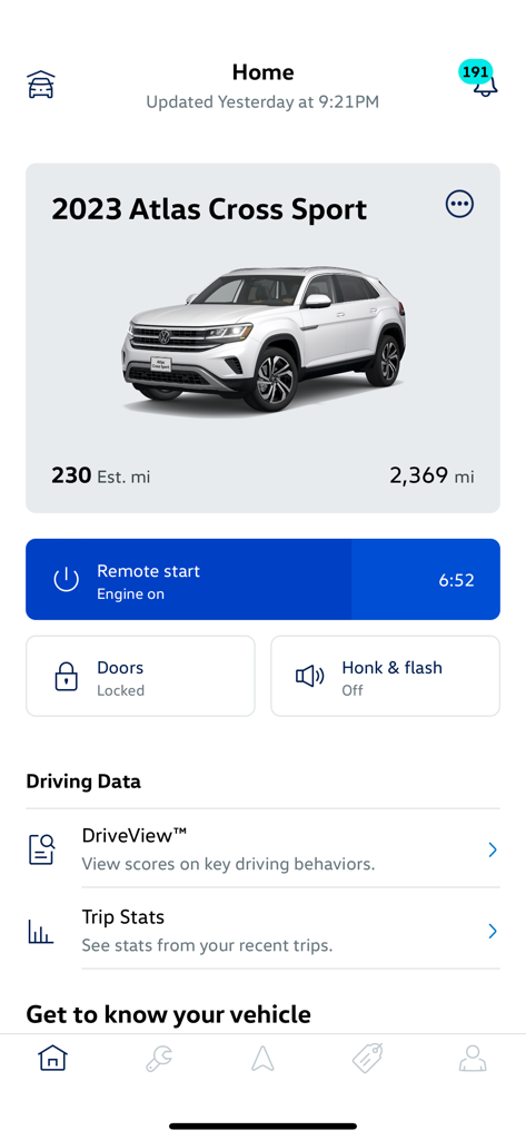 Home screen of the myVW app displaying a 2023 Atlas Cross Sport vehicle status with remote engine start active