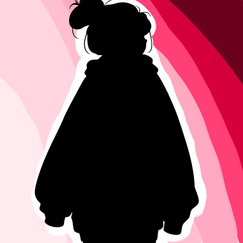 realistic girl with a oversized sweatshirt on and a bun