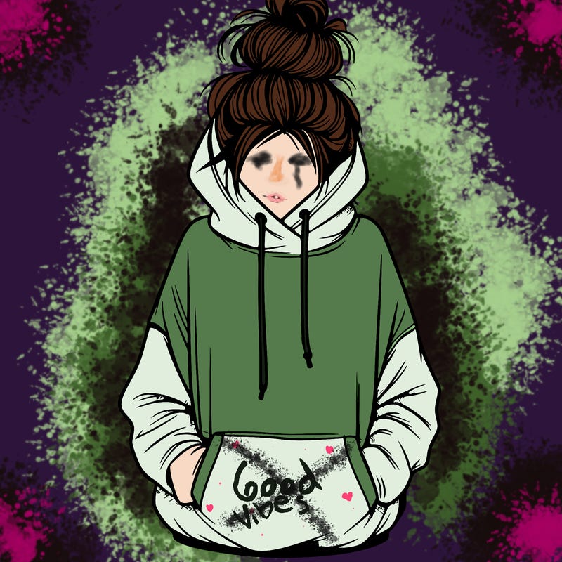 girl with messy bun and an oversized hoodie