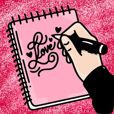 a hand writing “love” in calligraphy on a notebook