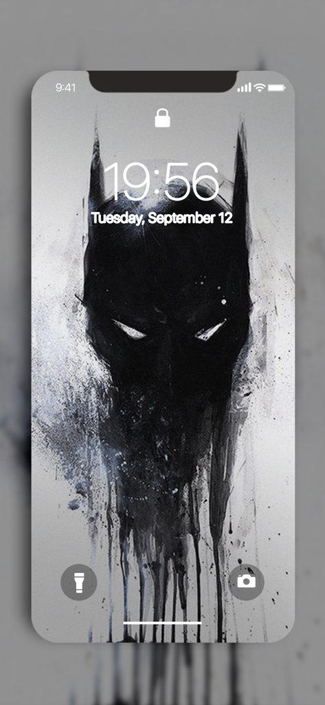Dark artistic Batman wallpaper on iPhone lock screen