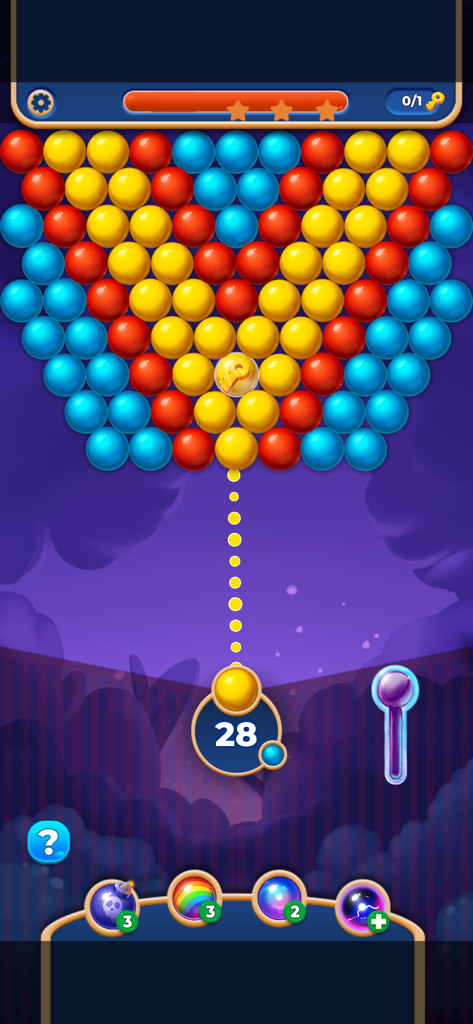 Un colorido nivel de juego de disparar burbujas con bolas rojas, amarillas y azules y una línea de puntería punteada.