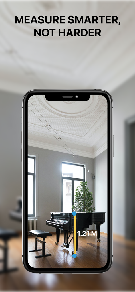 Measure Height With Camera App - Smartphone using augmented reality to measure the height of a grand piano in an elegant room.