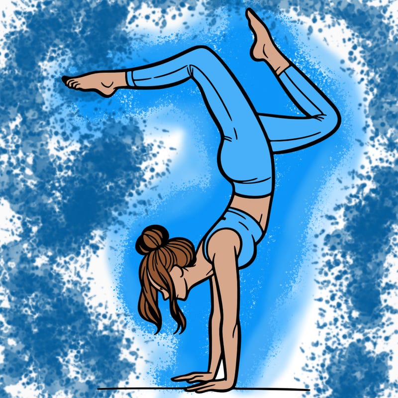a woman doing a handstand