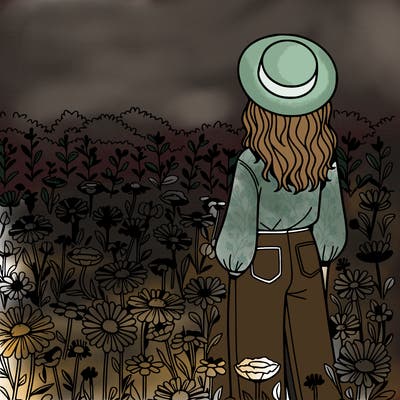 a woman in a field of flowers