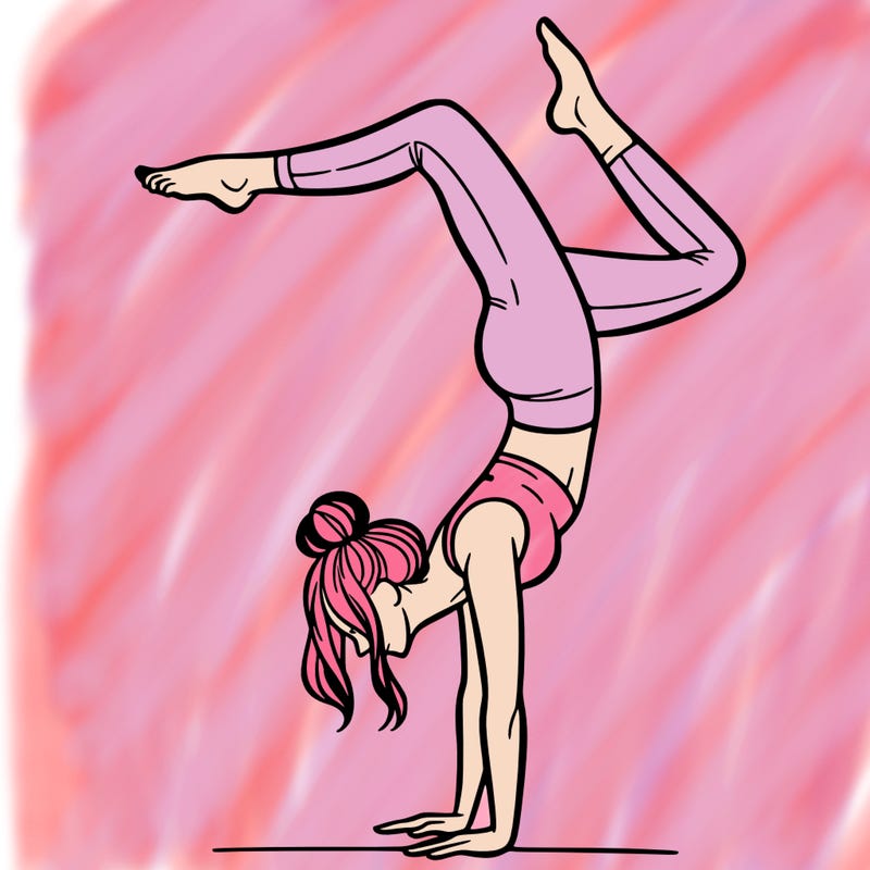 a woman doing a handstand