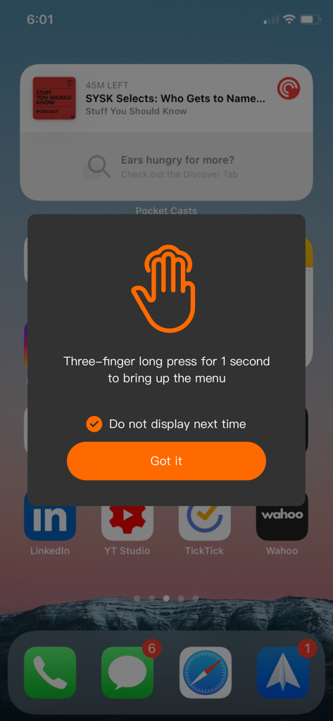 Wormhole - CrossLink - Wormhole CrossLink app instruction screen showing a three finger long press gesture to open the menu