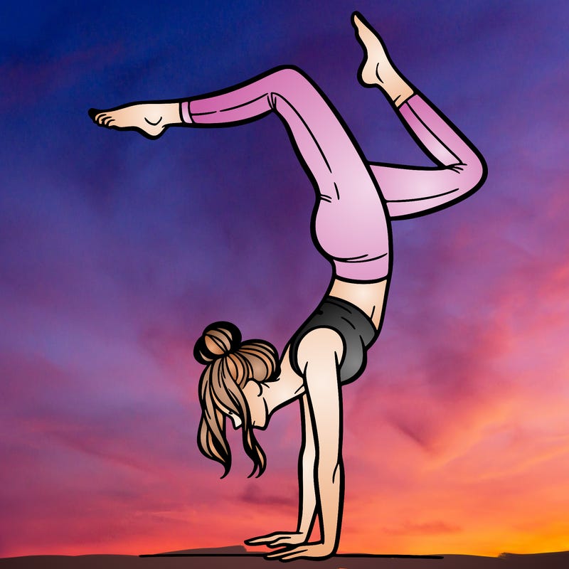 a woman doing a handstand