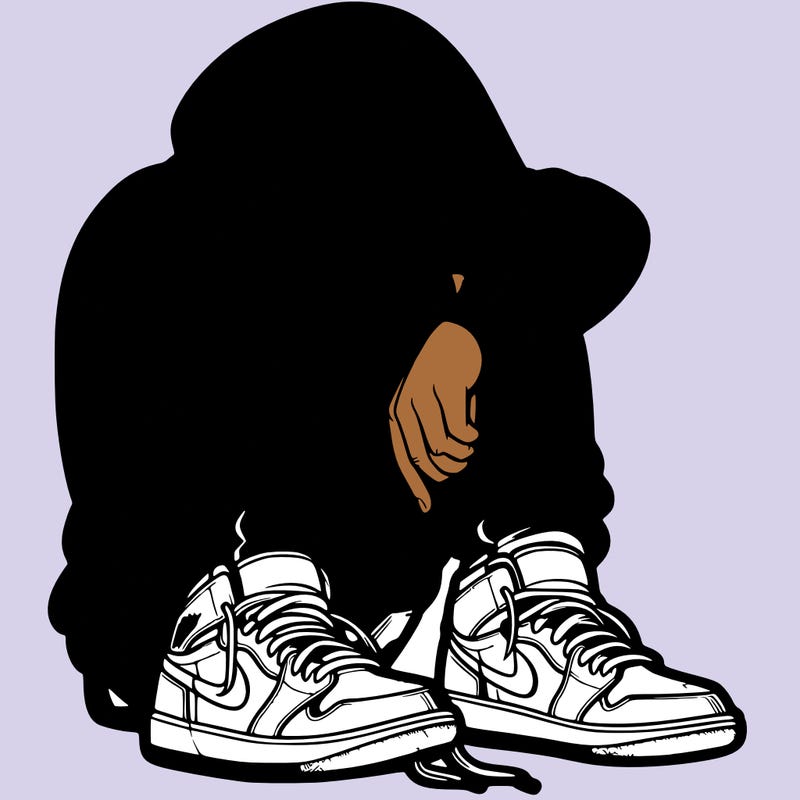 depressed man wearing hoodie and jordan shoes and baggy jeans
