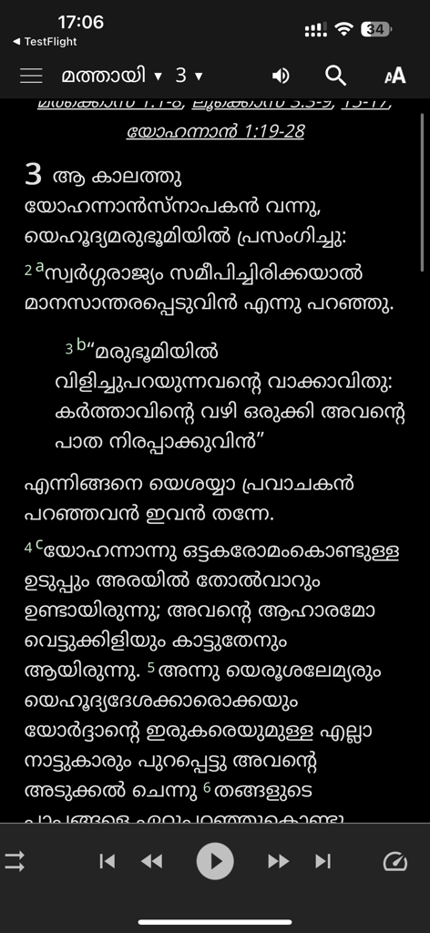 Binoy Chacko Audio Bible - Pantalla de la aplicación Biblia en Audio de Binoy Chacko que muestra el texto de la Biblia Malayalam con controles del reproductor de audio en modo nocturno