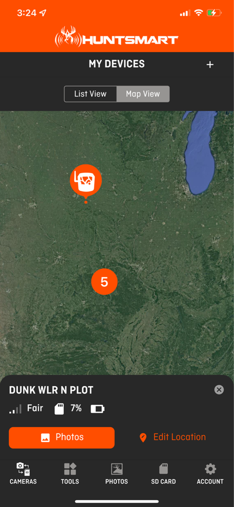 Satellite map view of trail camera locations in the HuntSmart app.