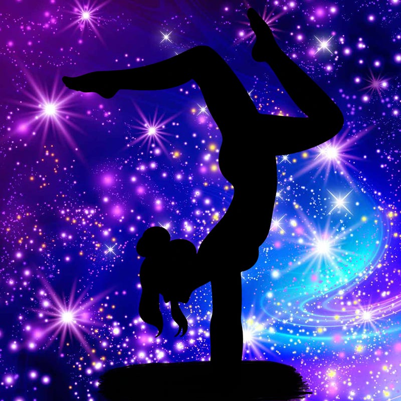 a woman doing a handstand