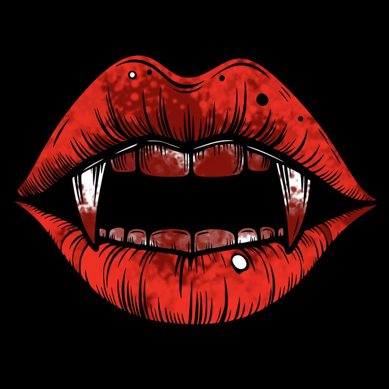 lips with vampire teeth