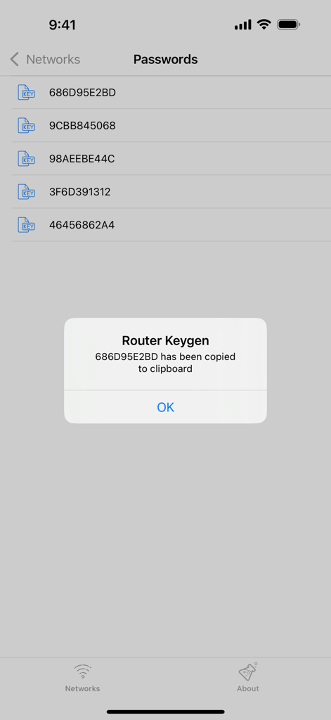 Una lista de contraseñas WiFi generadas en la aplicación Router Keygen con un mensaje de confirmación de copia al portapapeles