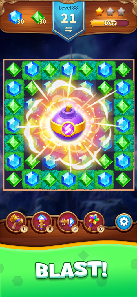Jewels Adventure Match Blast - A purple bomb exploding among blue and green gemstones in a match three puzzle game level