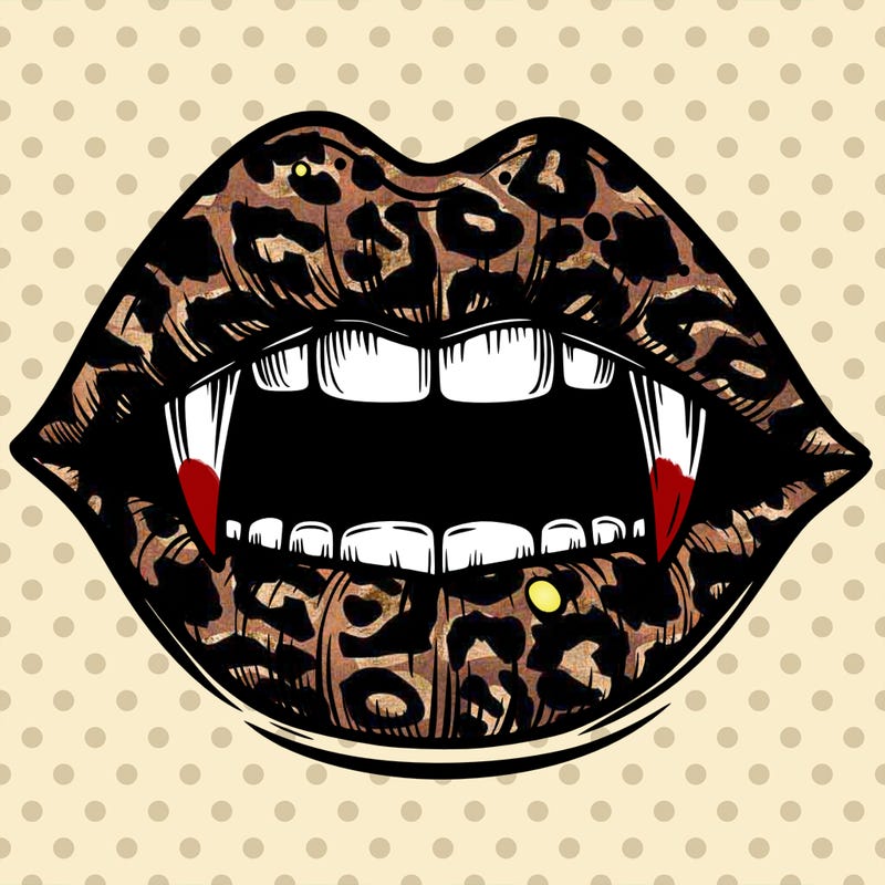 lips with vampire teeth