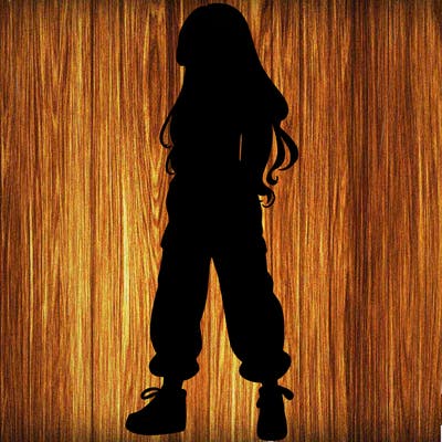 girl in baggy pants crop top and long hair