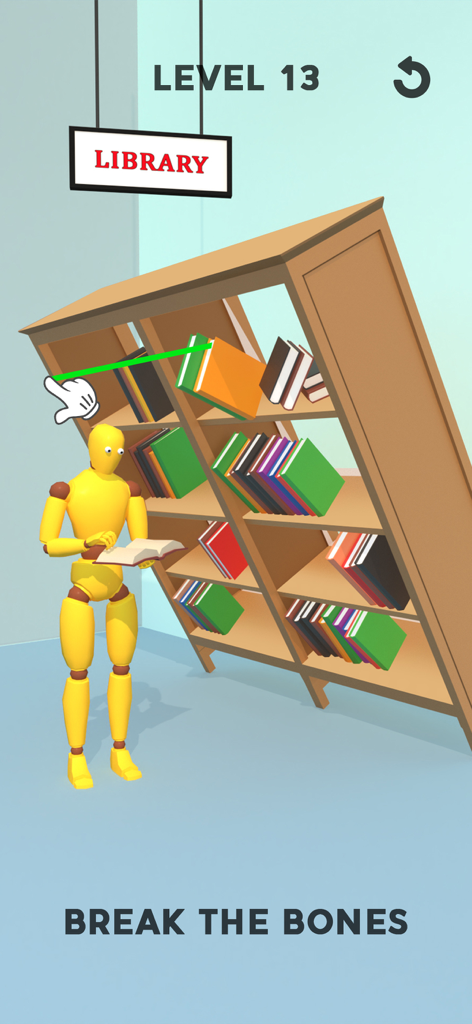 Mannequin ragdoll jaune écrasé par une étagère tombante dans une bibliothèque
