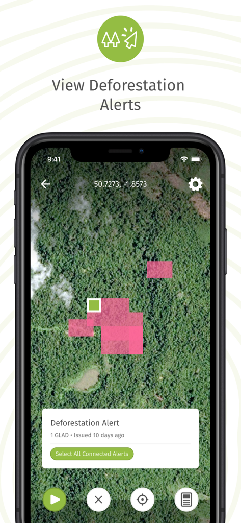 La aplicación Forest Watcher muestra un mapa satelital con áreas rosadas que indican alertas de deforestación