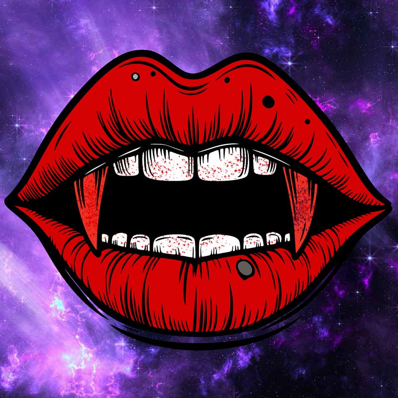 lips with vampire teeth