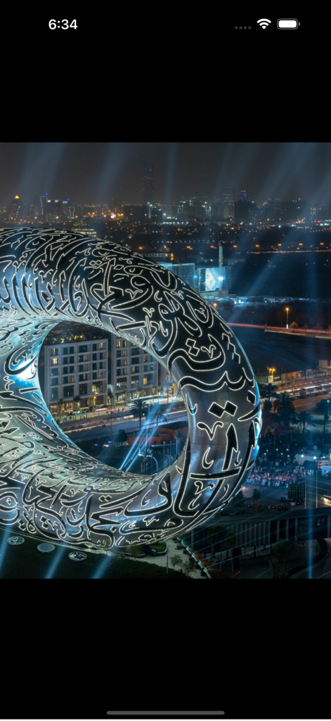 ASIAN Geographic Magazine - A stunning night photograph of the Museum of the Future in Dubai with glowing Arabic calligraphy