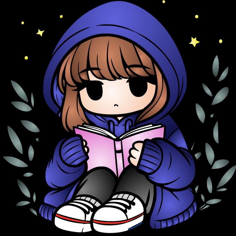 girl in oversized hoodie reading a book