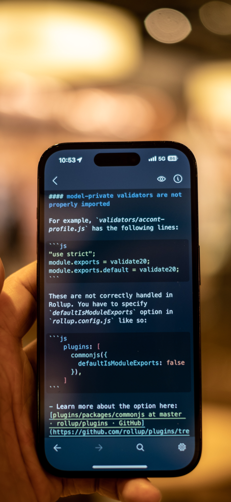 Smartphone screen showing technical notes and code snippets with syntax highlighting in the Inkdrop Markdown app.