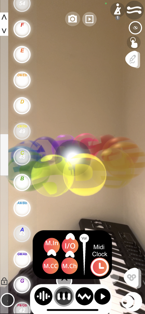BOCLAA app showing an augmented reality interface with floating colorful spheres and music production controls.