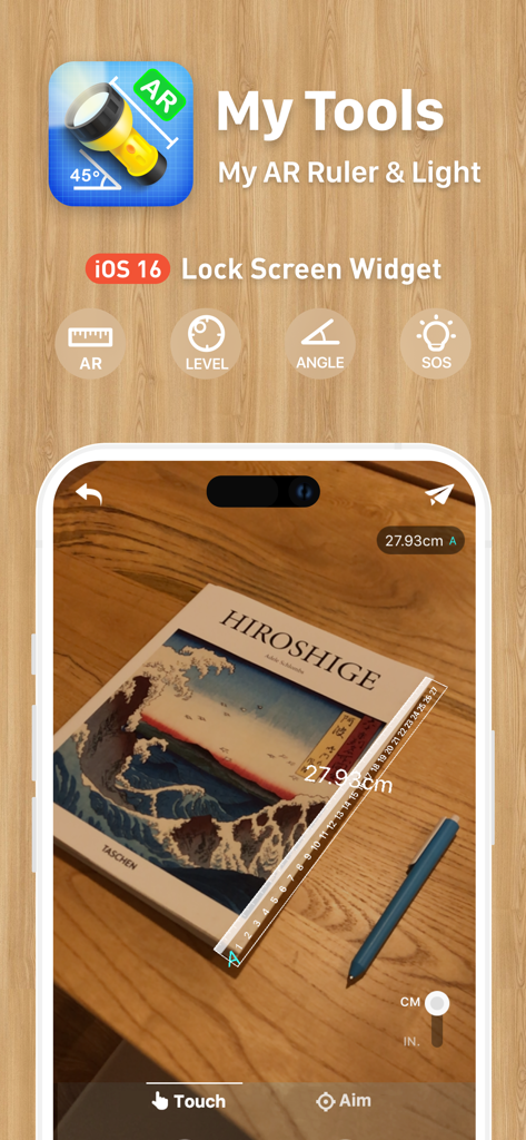 Écran de smartphone montrant l'application MyTools utilisant une règle AR pour mesurer un livre sur une surface en bois.
