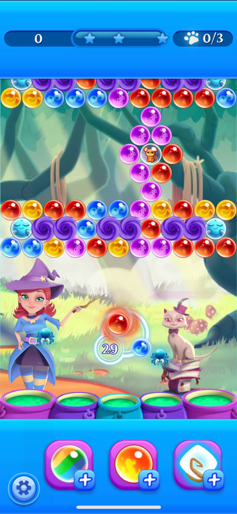 Stella the witch and her cat in a magical bubble shooting level of Bubble Witch 2 Saga